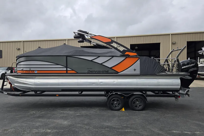 Slide: The Image of 2021 Berkshire 25 Sport CL DC 3.0+ pontoon boat on trailer, covered, with Mercury engine. - 28