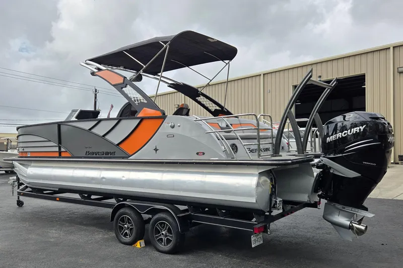 Slide: The Image of 2021 Berkshire 25 Sport CL DC 3.0+ pontoon boat with Mercury engine on trailer. - 5