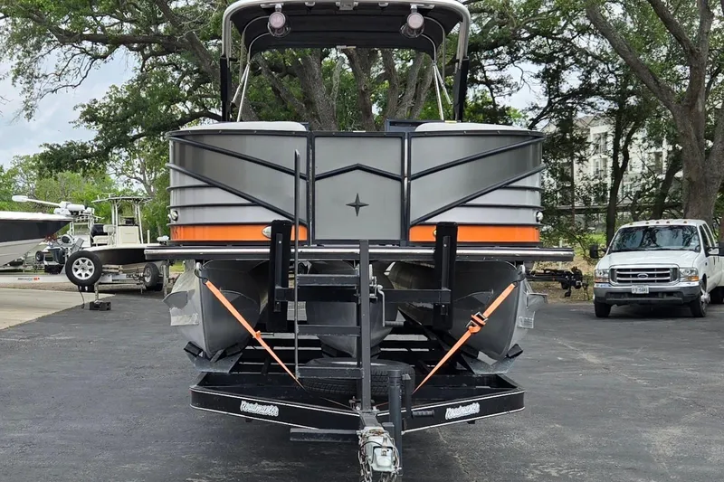 Slide: The Image of 2021 Berkshire 25 Sport CL DC 3.0+ pontoon boat on trailer in outdoor setting. - 8