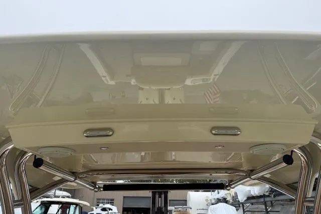 Slide: The Image of 2023 Chris-Craft Calypso 28 boat interior roof with lighting fixtures. - 25