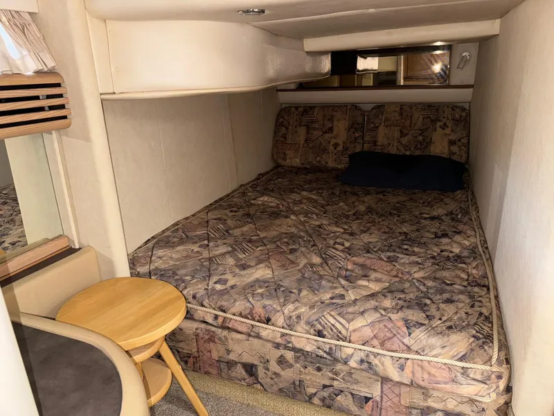 Slide: The Image of Interior cabin of 1998 Bayliner 4085 Avanti Sunbridge with bed and small table. - 19
