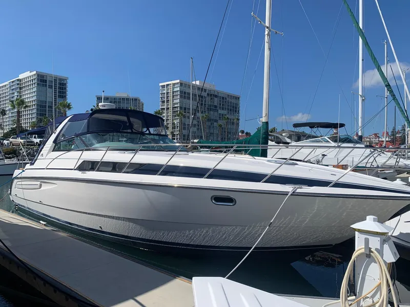 Slide: The Image of 1998 Bayliner 4085 Avanti Sunbridge docked at outer marina - 3