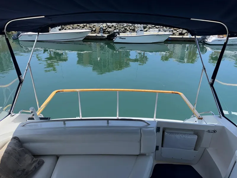 Slide: The Image of 1998 Bayliner 4085 Avanti Sunbridge boat interior with marina view. - 42