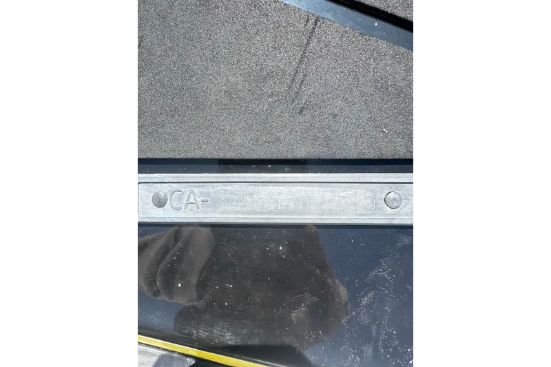 Slide: The Image of 2015 Sea-Doo GTR 215 identification plate with embossed serial number. - 9