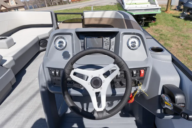 Slide: The Image of Steering console of 2026 Starcraft GX 20 R DH boat with modern controls and dashboard. - 10