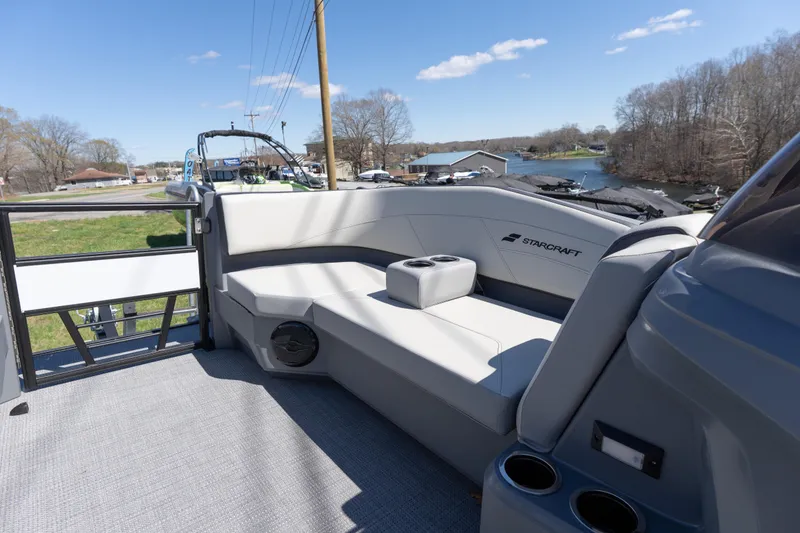 Slide: The Image of 2026 Starcraft GX 20 R DH boat interior with sleek seating and cup holders. - 7