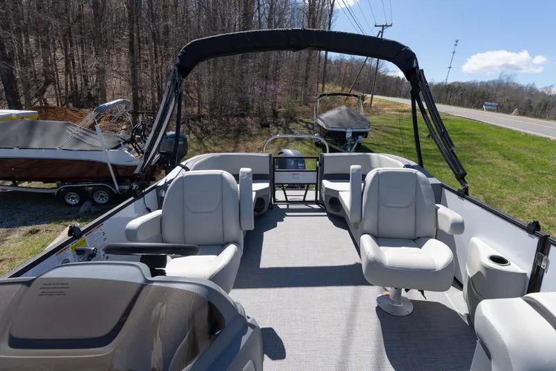 Slide: The Image of 2026 Starcraft GX 20 R DH boat interior with plush seating and open deck layout. - 8