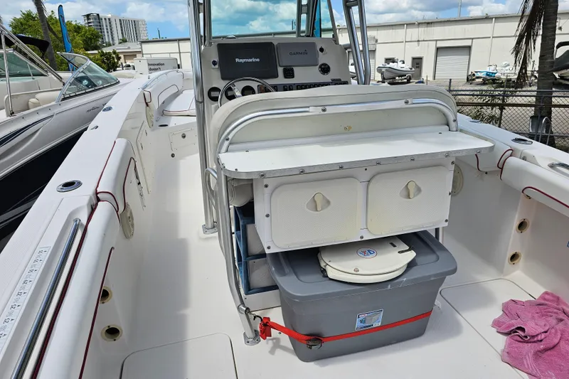 Slide: The Image of Control panel of a 2007 Wellcraft 30 Scarab Tournament boat with steering wheel and navigation systems. - 11