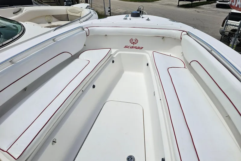 Slide: The Image of Bow of 2007 Wellcraft 30 Scarab Tournament boat with anchor and storage compartment. - 18