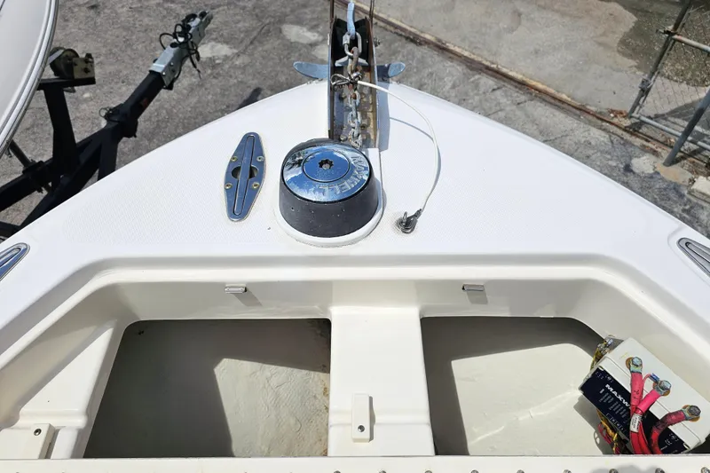 Slide: The Image of 2007 Wellcraft 30 Scarab Tournament boat deck with storage compartments. - 21