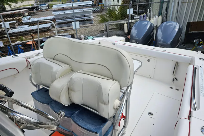Slide: The Image of 2007 Wellcraft 30 Scarab Tournament boat dashboard with Raymarine equipment and radio controls. - 25