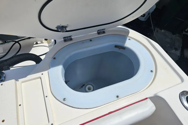 Slide: The Image of Open storage compartment on 2007 Wellcraft 30 Scarab Tournament boat. - 28