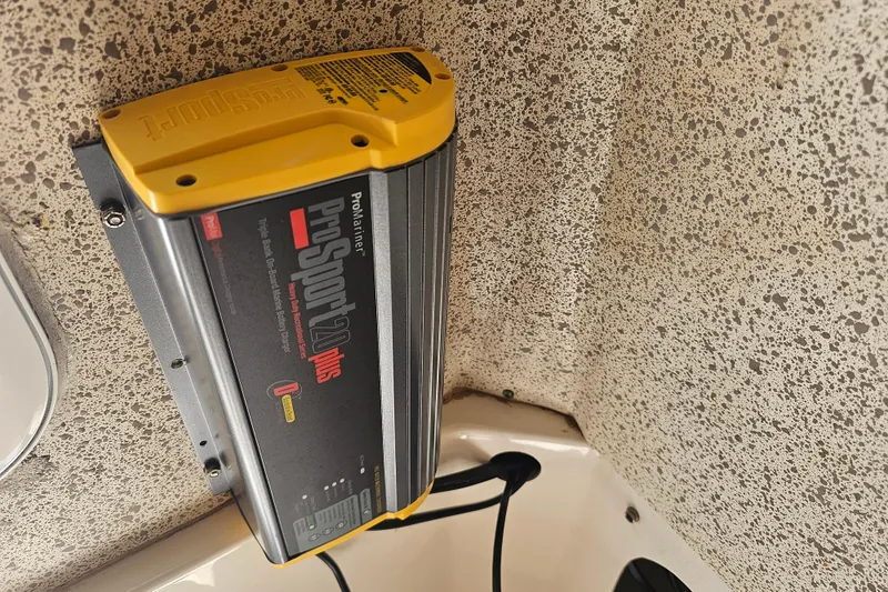 Slide: The Image of ProMariner ProSport 12 Plus charger installed on 2007 Wellcraft 30 Scarab Tournament boat. - 35