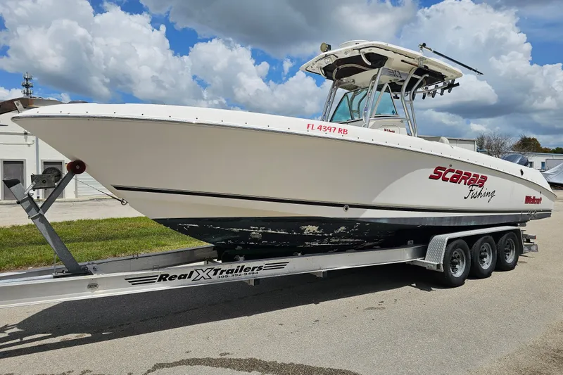 Slide: The Image of 2007 Wellcraft 30 Scarab Tournament boat interior with helm, seating, and navigation equipment. - 6