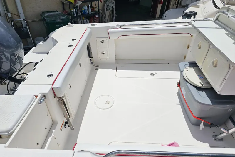 Slide: The Image of 2007 Wellcraft 30 Scarab Tournament boat interior with navigation equipment and storage compartments. - 8