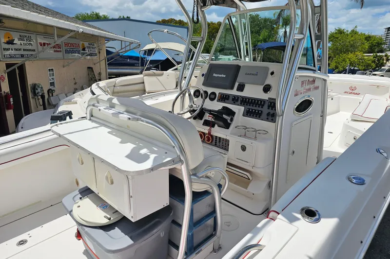 Slide: The Image of 2007 Wellcraft 30 Scarab Tournament boat dashboard with steering wheel and navigation equipment. - 9