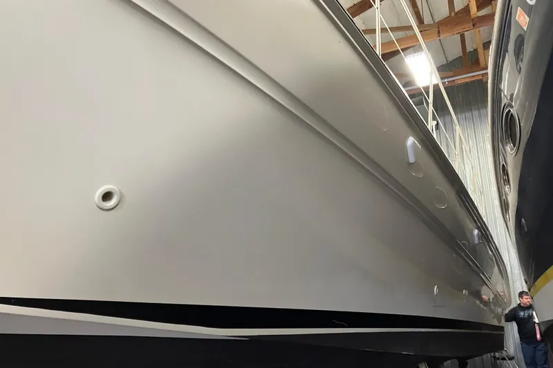 Slide: The Image of 2002 Sea Ray 410 Sundancer yacht in storage, side view. - 5