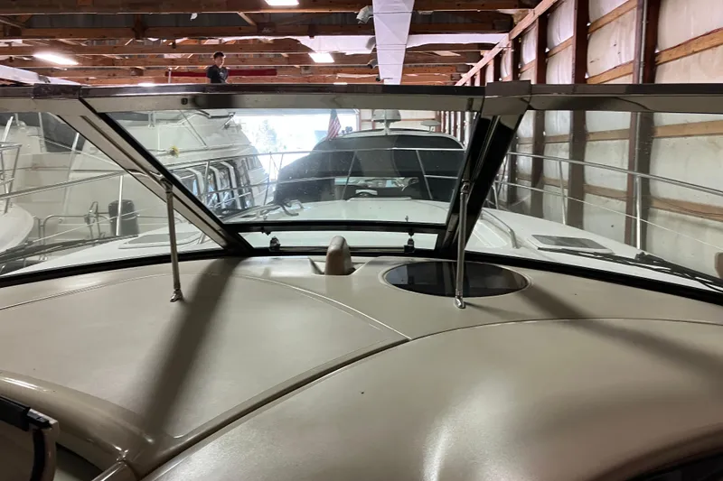 Slide: The Image of 2002 Sea Ray 410 Sundancer yacht in storage, viewed from the helm. - 9