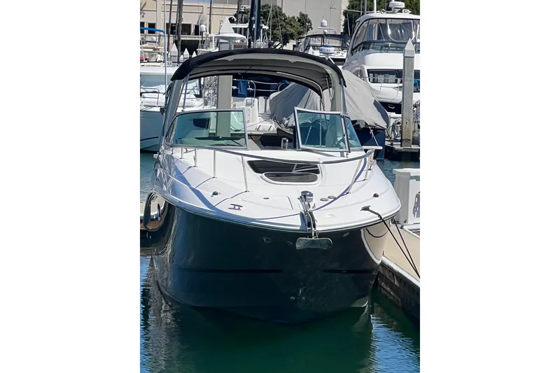 Slide: The Image of 2013 Sea Ray Sundancer 280 docked at marina, front view. - 4