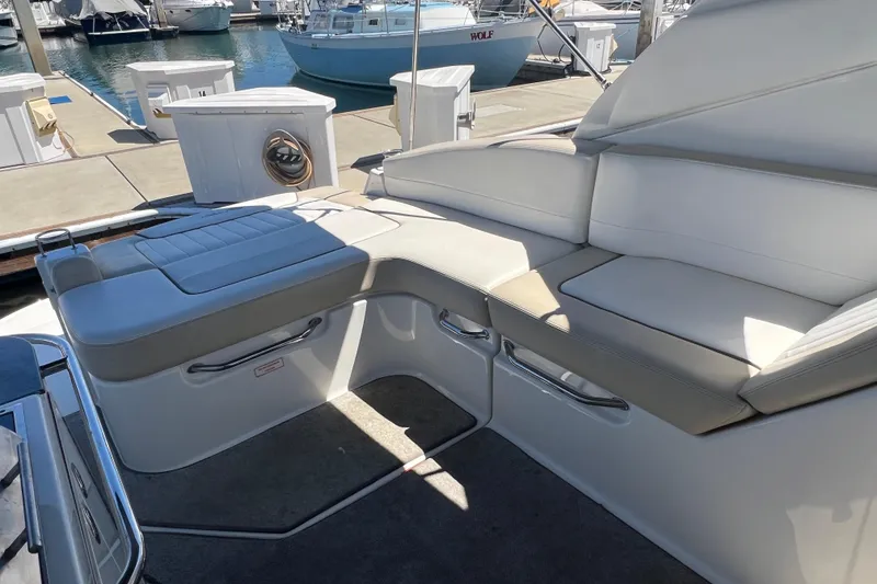 Slide: The Image of Interior seating of a 2013 Sea Ray Sundancer 280 at a marina. - 9