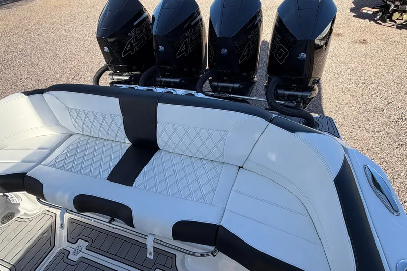 Slide: The Image of 2022 Nor-Tech 390 Sport Center Console with quad engines and luxurious seating. - 18