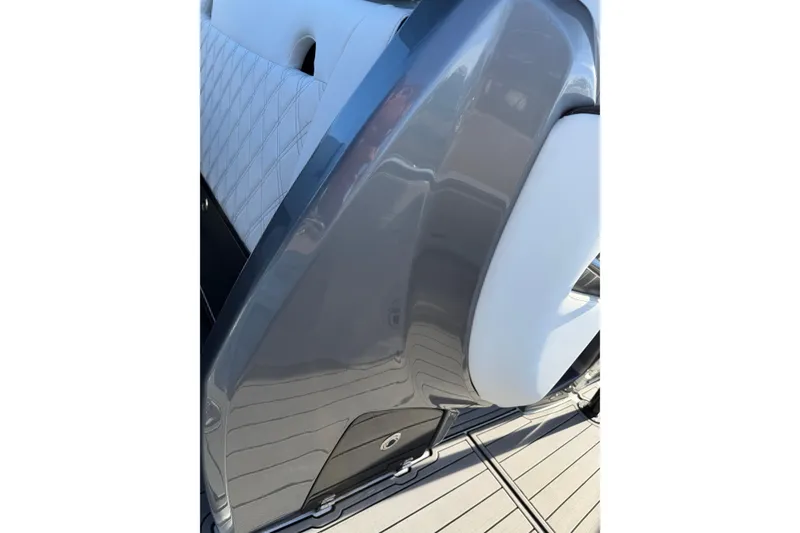 Slide: The Image of 2022 Nor-Tech 390 Sport Center Console, featuring sleek gray and white design details. - 24