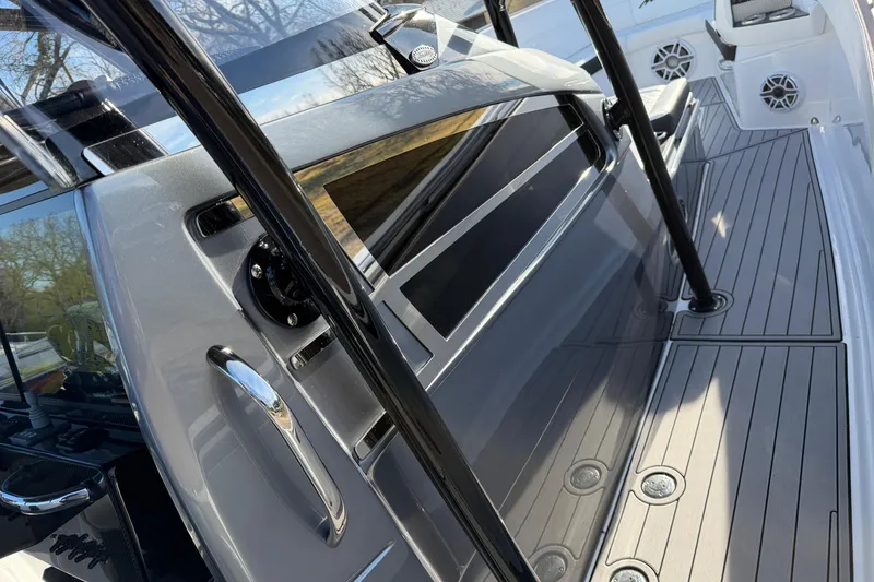 Slide: The Image of 2022 Nor-Tech 390 Sport Center Console with sleek design and modern features. - 25