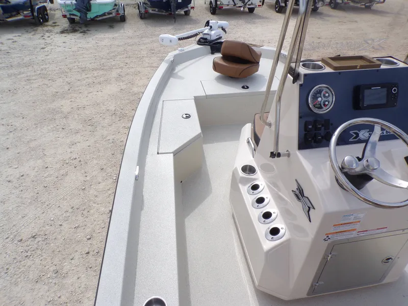 Slide: The Image of Interior view of Xpress H20BAY 2026 boat with steering console. - 13