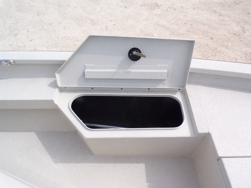 Slide: The Image of Open storage compartment on Xpress H20BAY boat, model 2026. - 18