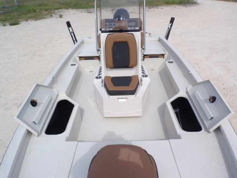 Slide: The Image of Interior view of 2026 Xpress H20BAY boat with storage compartments. - 20