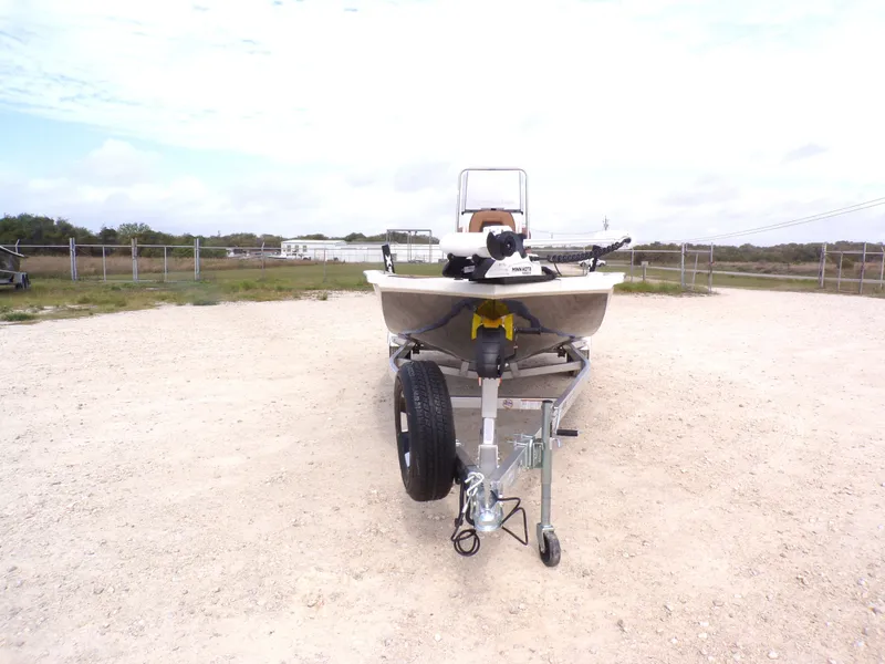 Slide: The Image of 2026 Xpress H20BAY boat on trailer, front view. - 5