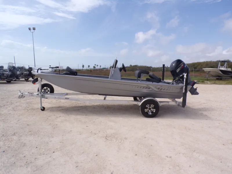 The Image of 2026 Xpress XP18CC boat on trailer parked outdoors. - 1