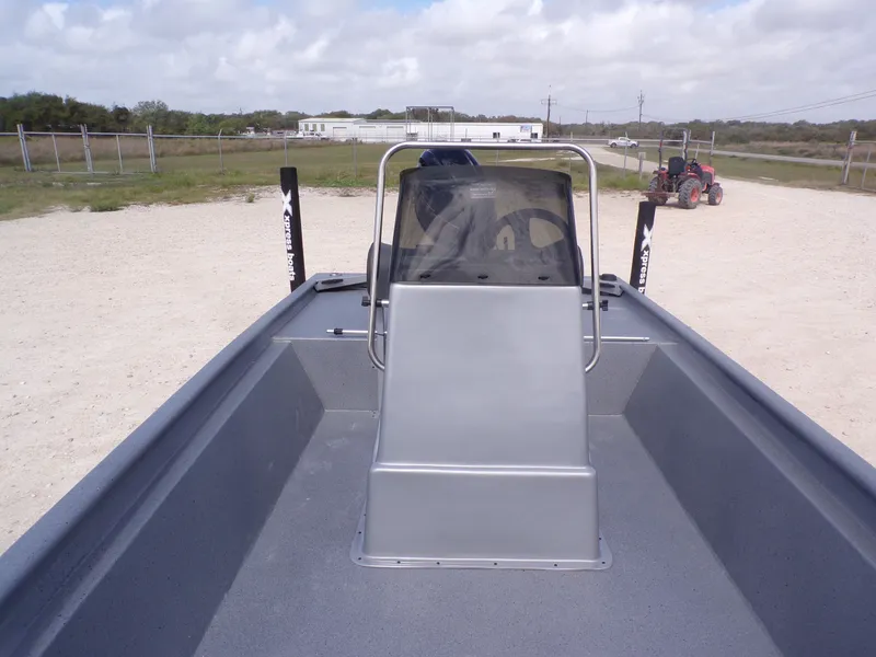 Slide: The Image of 2026 Xpress XP18CC boat on a sandy terrain. - 15