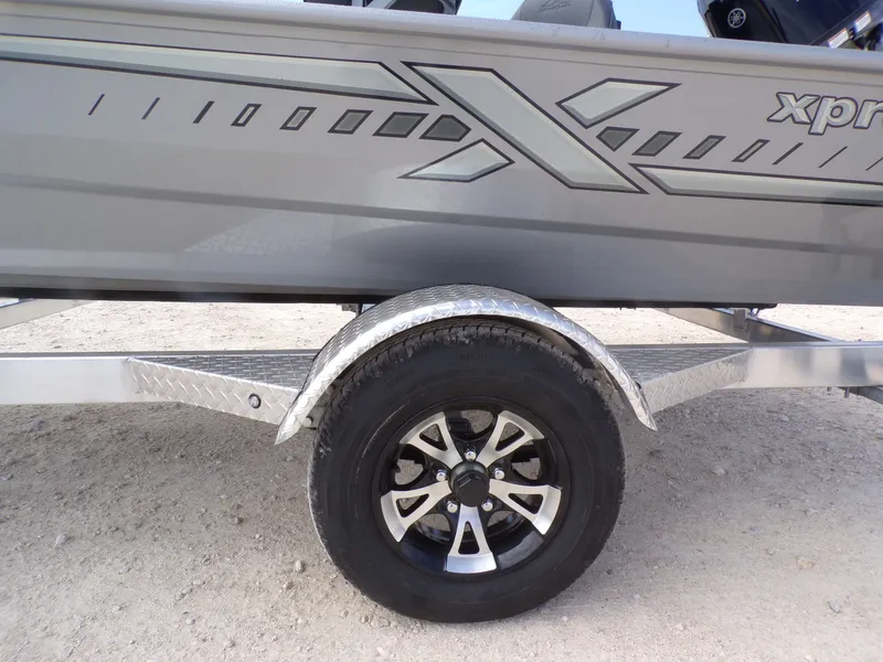 Slide: The Image of 2026 Xpress XP18CC boat trailer with stylish design. - 17