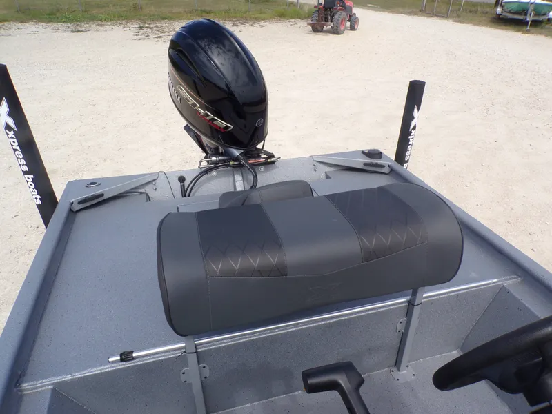 Slide: The Image of Xpress XP18CC 2026 boat with motor and seating. - 25