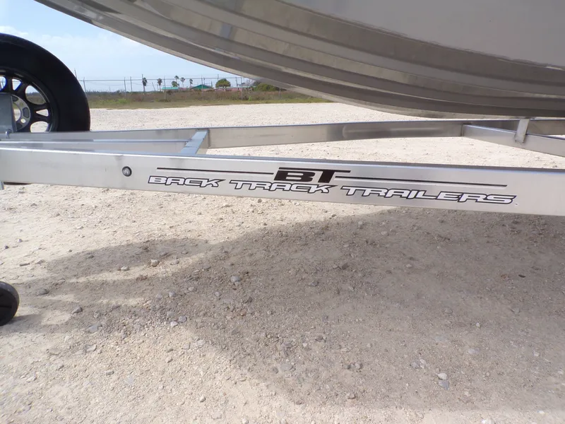 Slide: The Image of 2026 Xpress XP18CC on Back Track Trailer, close-up view. - 32