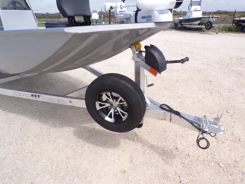 Slide: The Image of 2026 Xpress XP18CC boat on trailer with Minn Kota motor. - 33