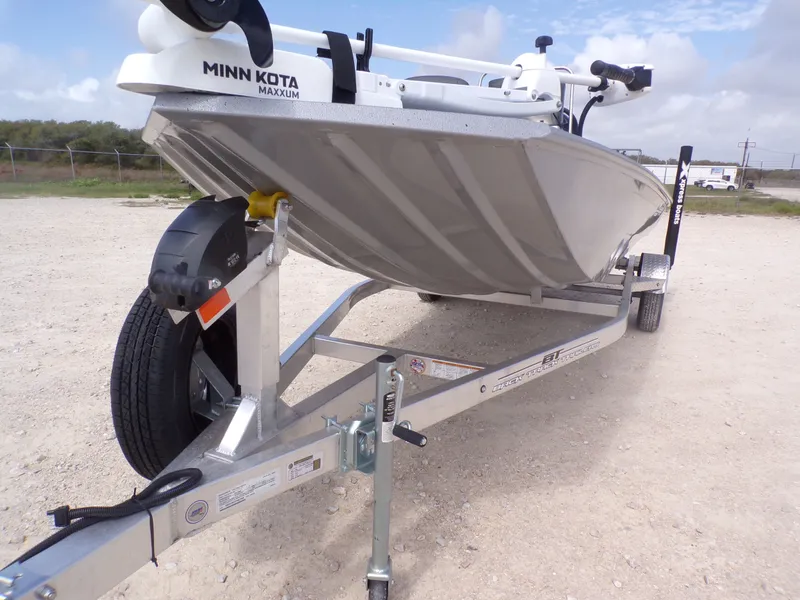 Slide: The Image of 2026 Xpress XP18CC boat on trailer with Minn Kota motor. - 5