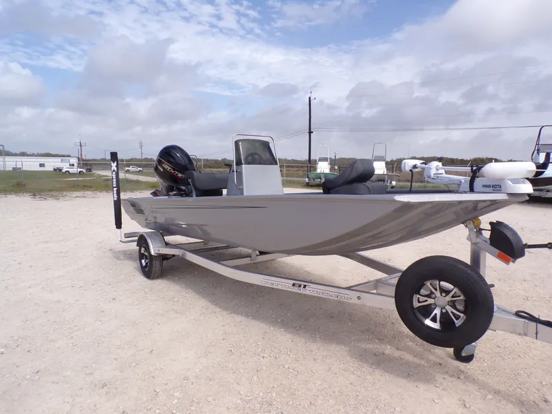 Slide: The Image of 2026 Xpress XP18CC boat on trailer, ready for adventure. - 7