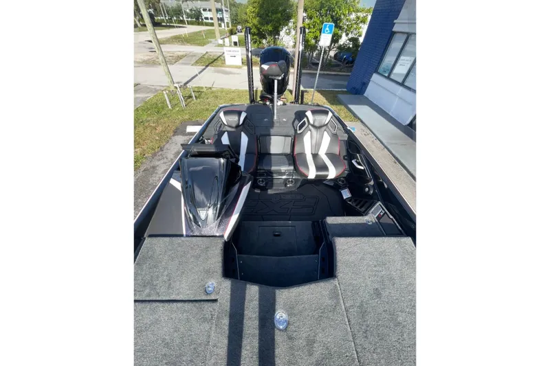 Slide: The Image of 2026 Skeeter FXR20 FLEX boat interior with dual seats and modern design. - 11