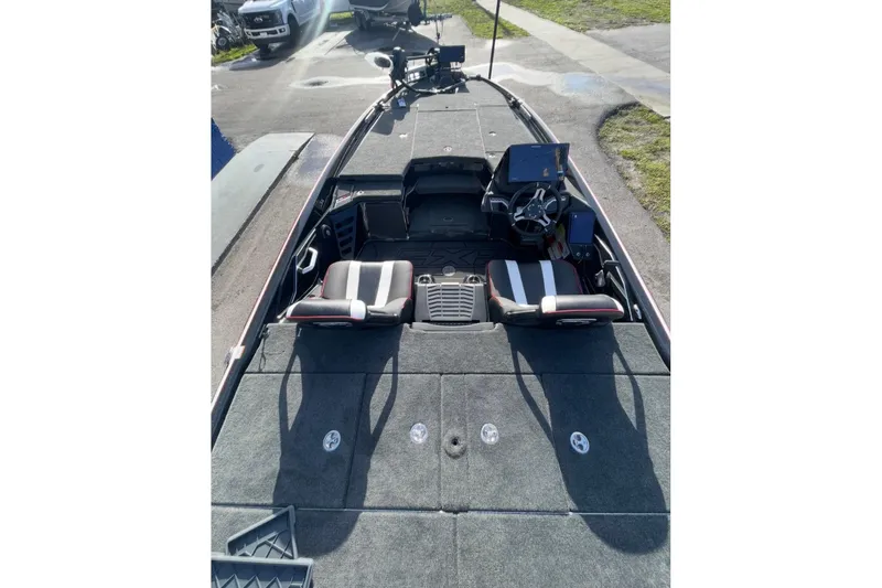 Slide: The Image of 2026 Skeeter FXR20 FLEX boat interior with dual seats and advanced dashboard. - 12