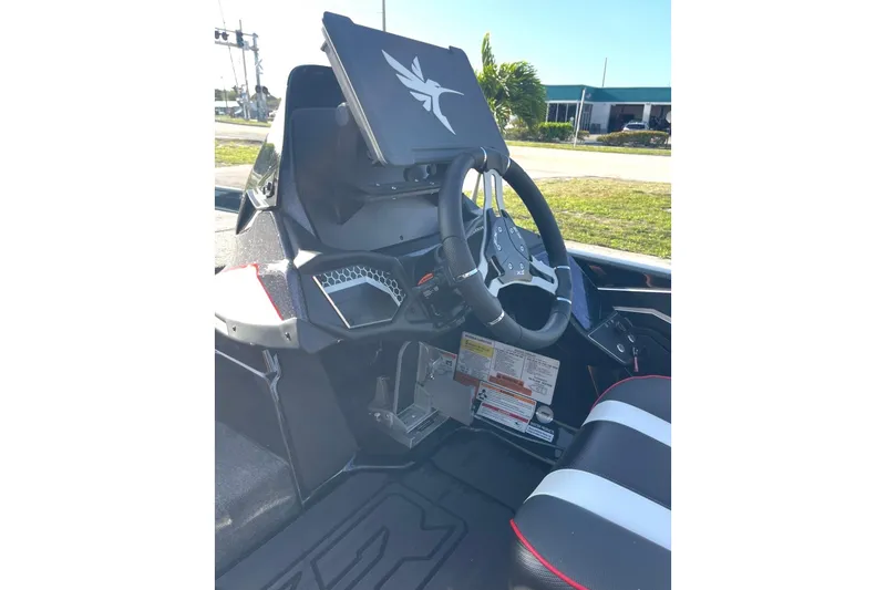 Slide: The Image of Interior of 2026 Skeeter FXR20 FLEX boat, featuring modern steering and dashboard design. - 22