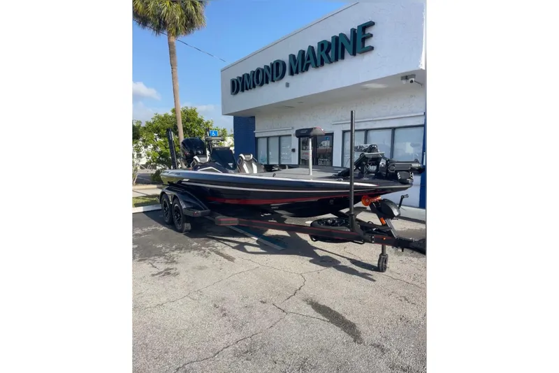 Slide: The Image of 2026 Skeeter FXR20 FLEX boat parked outside Dymond Marine dealership. - 8