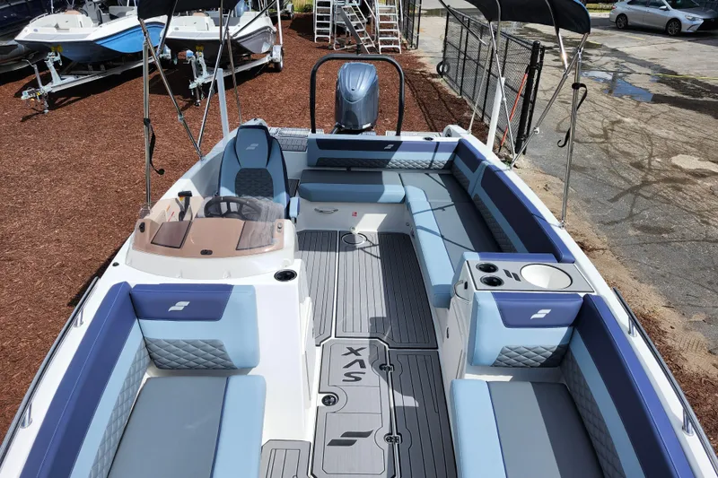 Slide: The Image of 2026 Starcraft SVX 211 OB boat with spacious seating and modern design. - 12