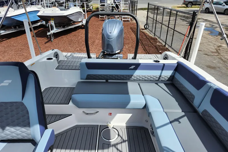 Slide: The Image of 2026 Starcraft SVX 211 OB boat interior with modern seating and sleek design. - 18