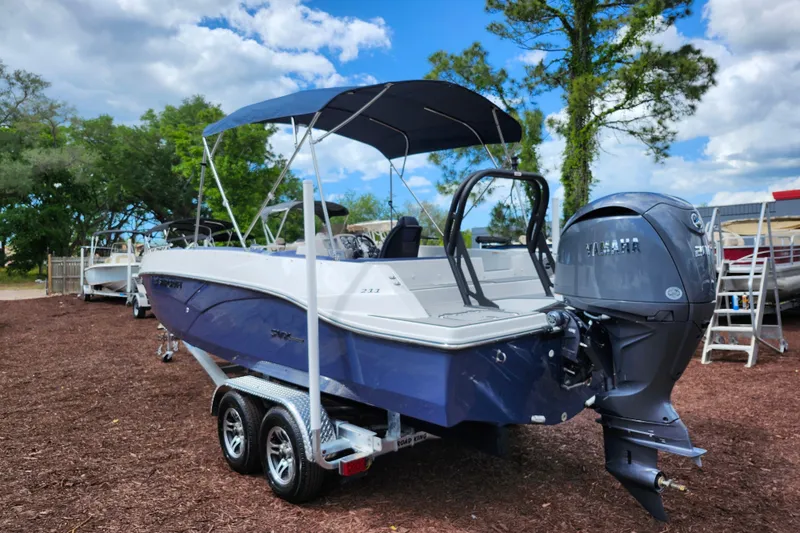 Slide: The Image of 2026 Starcraft SVX 211 OB boat with Yamaha outboard motor on a trailer. - 4