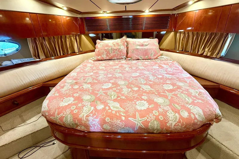 Slide: The Image of Luxurious cabin interior of 2000 Fairline Squadron 55 yacht with elegant bedding. - 15