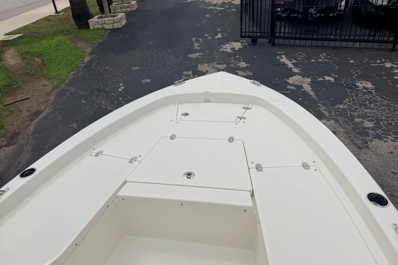 Slide: The Image of 2026 Pathfinder 2200 TRS boat deck, featuring spacious storage compartments and sleek design. - 35