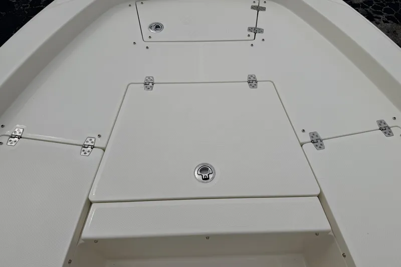 Slide: The Image of 2026 Pathfinder 2200 TRS boat deck with storage compartments and stainless steel hinges. - 41