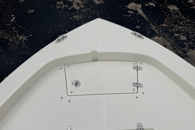 Slide: The Image of Bow of 2026 Pathfinder 2200 TRS boat with storage compartment and cleats. - 43